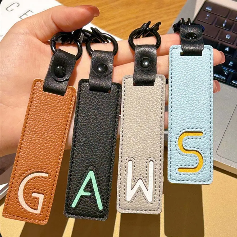 Классический брелок из искусст – обзор и цена Monogram Keychain Leather